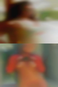 Nude woman spanking ebony man.
